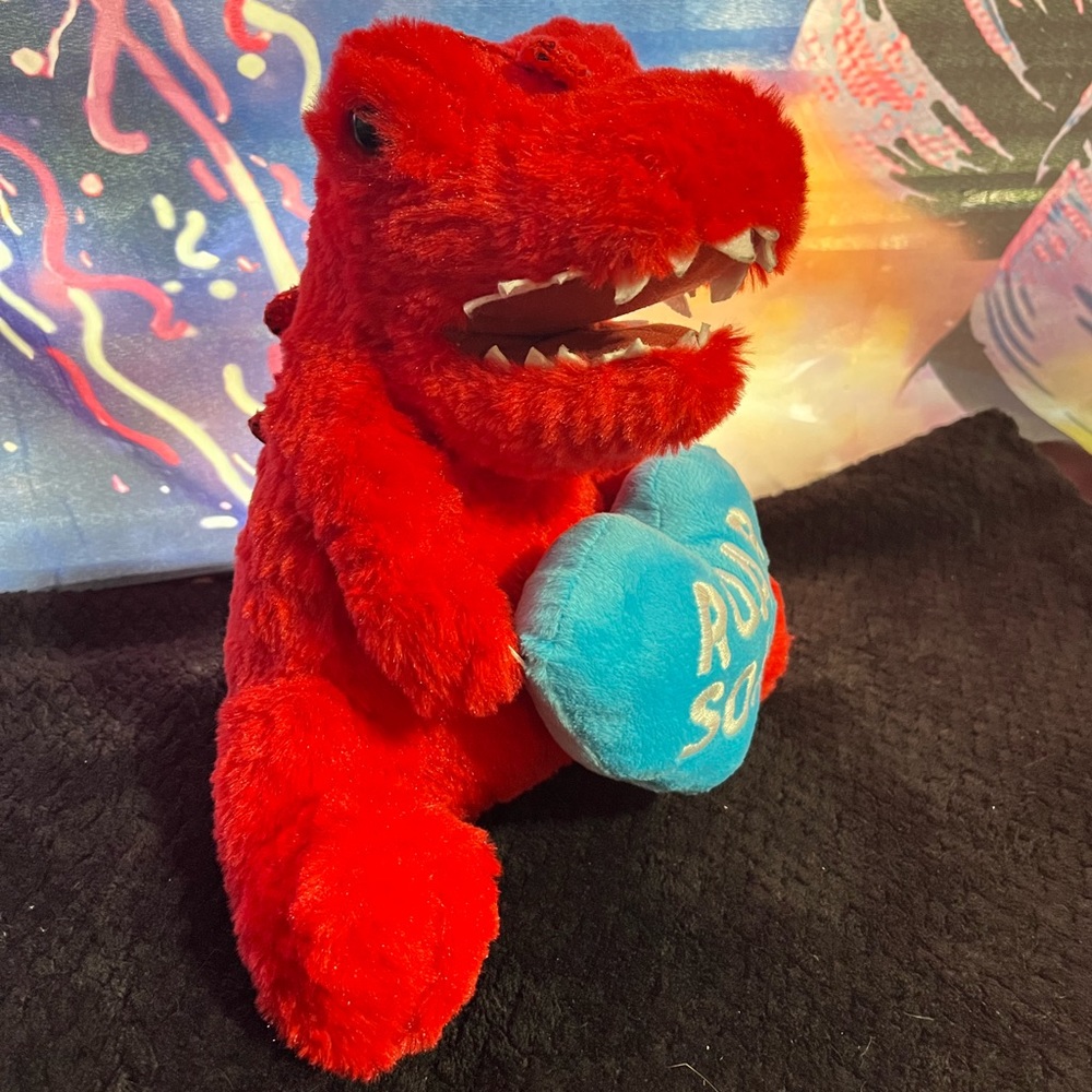 Red valentines dinosaur plush “roar some”